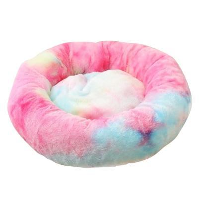 A cozy round dog bed in soft corduroy material, designed for comfort and security, perfect for small to medium-sized dogs.