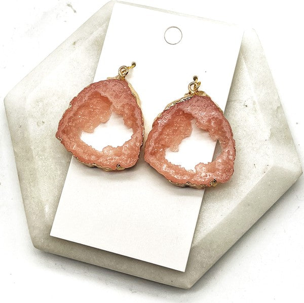 A pair of Pink Coral Agate Slice Resin Statement Earrings with gold accents, showcasing unique pink patterns and a stylish design.