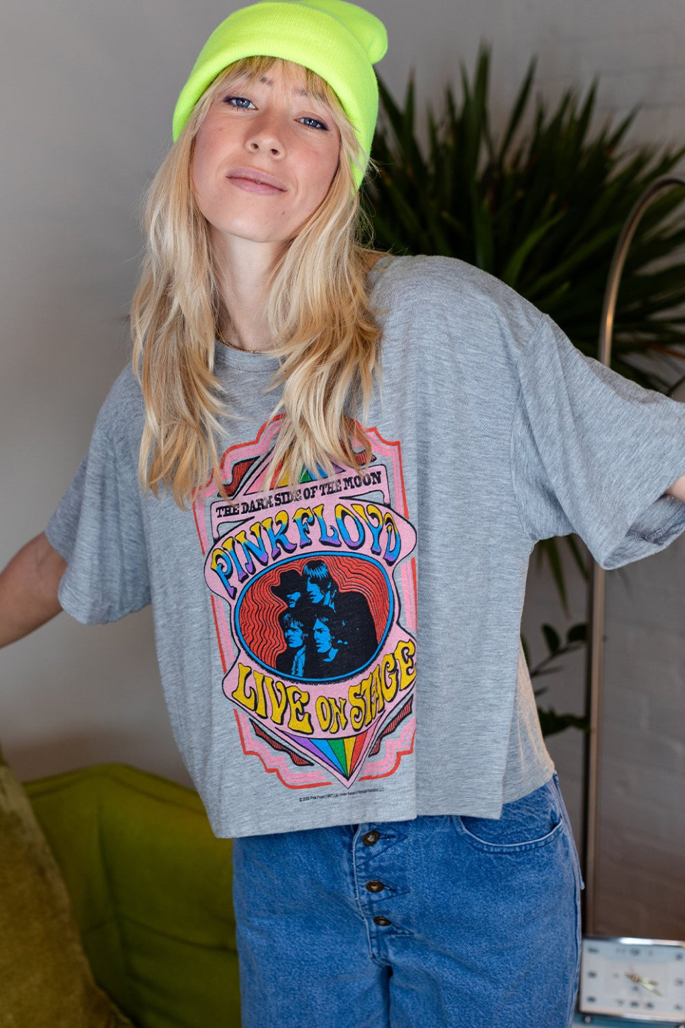 A stylish cropped tee featuring the Pink Floyd Dark Side Of The Moon graphic, made from 100% organic cotton in heather gray color.