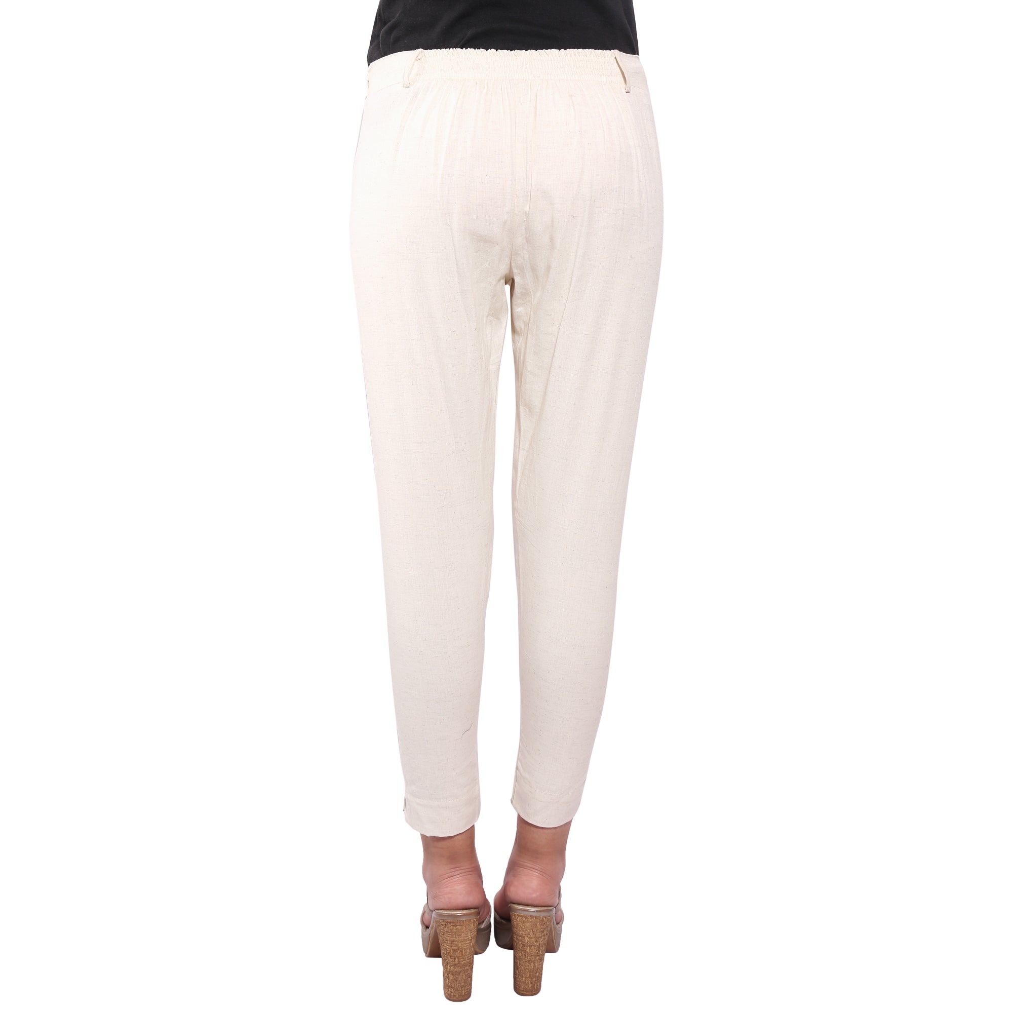 Piya Bawari off-white cotton cigarette pant displayed elegantly, showcasing its smooth fabric and tailored fit.