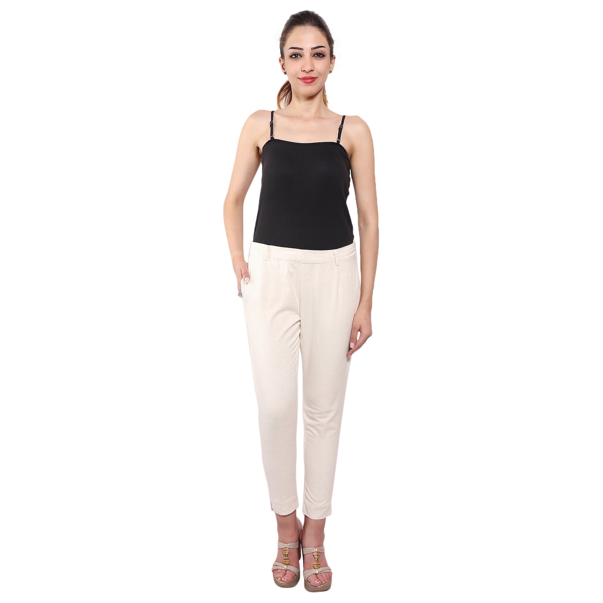 Piya Bawari off-white cotton cigarette pant displayed elegantly, showcasing its smooth fabric and tailored fit.