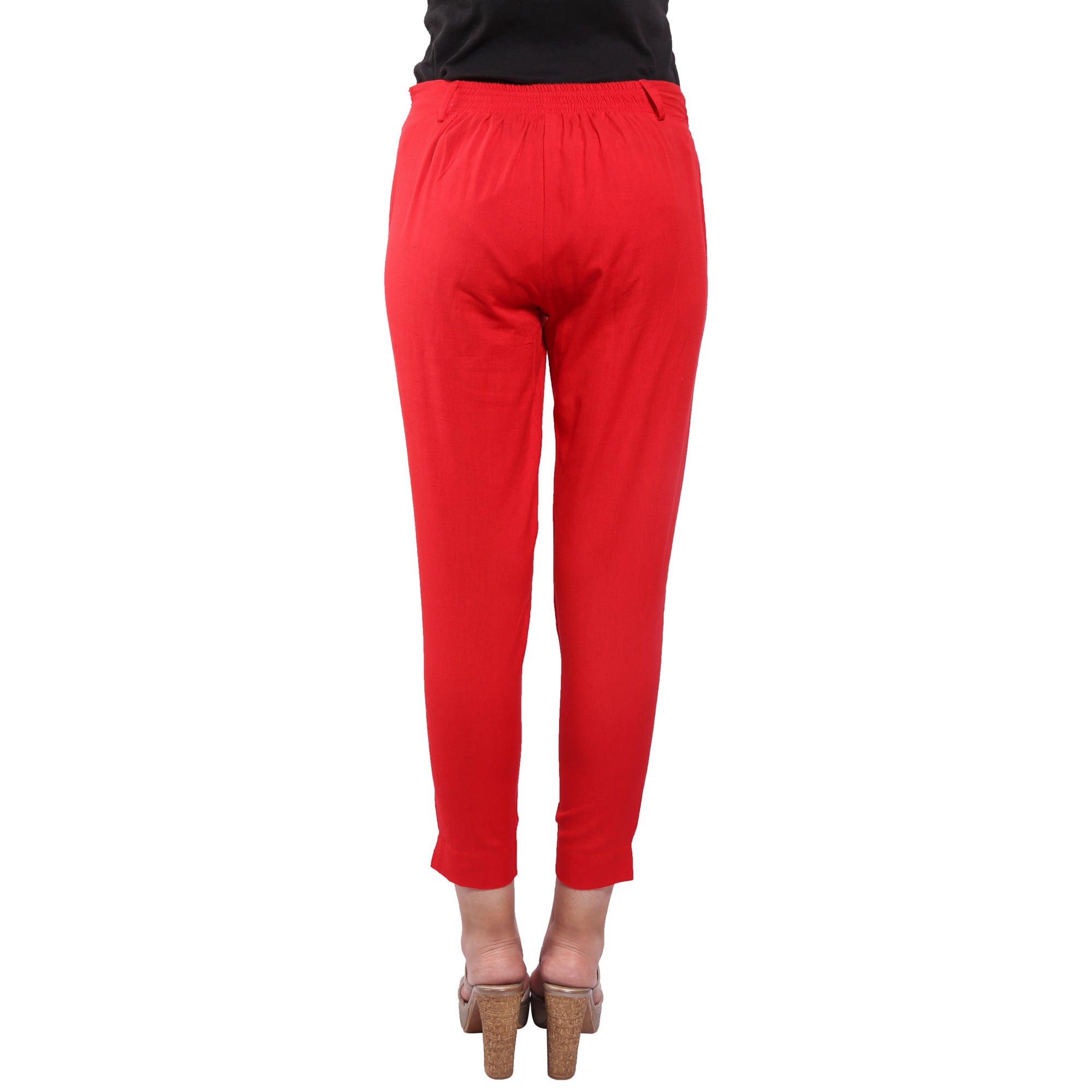 Piya Bawari Red Cotton Cigarette Pant displayed on a mannequin, showcasing its smooth fabric and stylish design.