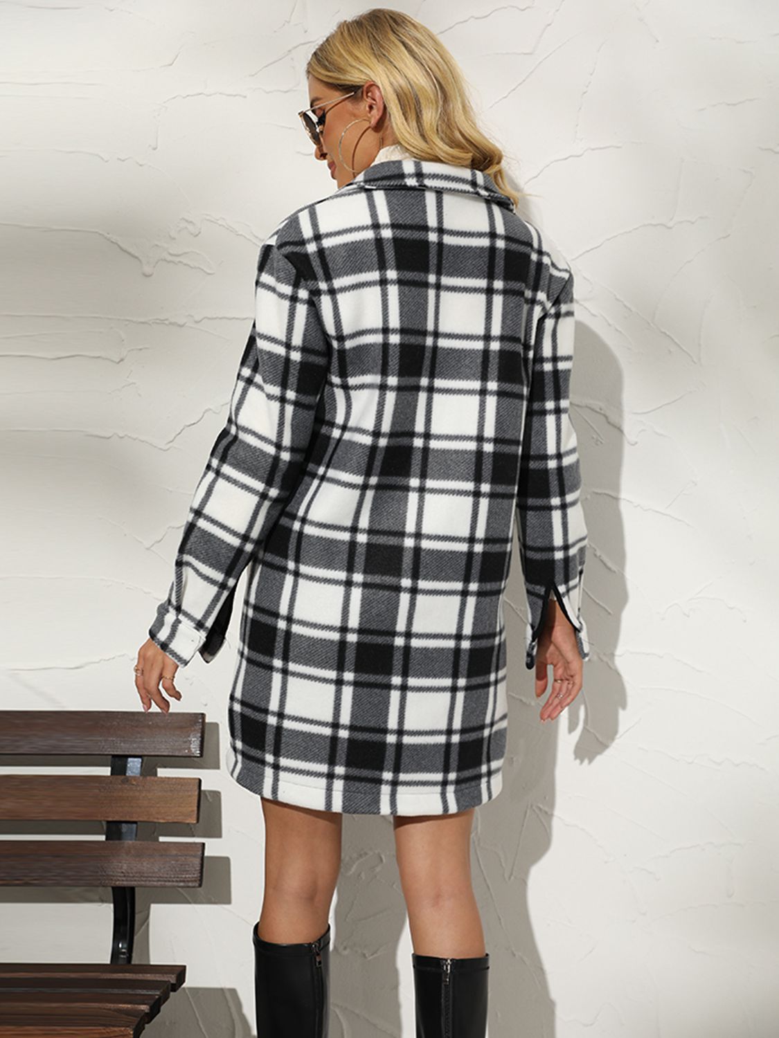 A stylish plaid collared longline coat featuring a chic design, long sleeves, and practical pockets, perfect for any occasion.