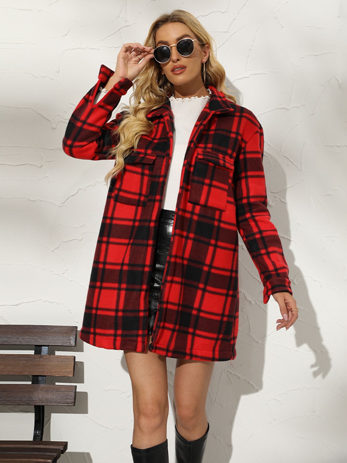 A stylish plaid collared longline coat featuring a chic design, long sleeves, and practical pockets, perfect for any occasion.