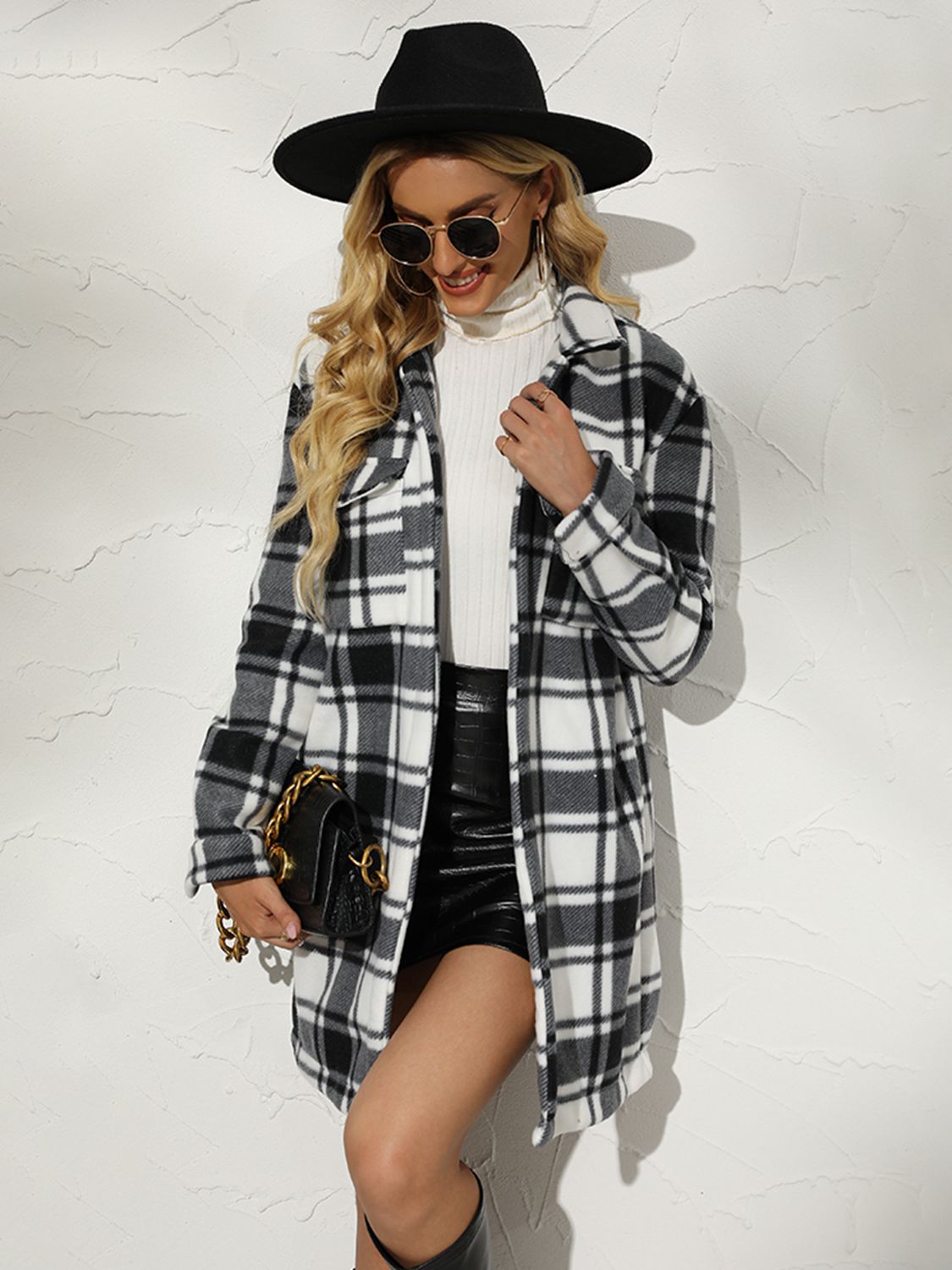 A stylish plaid collared longline coat featuring a chic design, long sleeves, and practical pockets, perfect for any occasion.