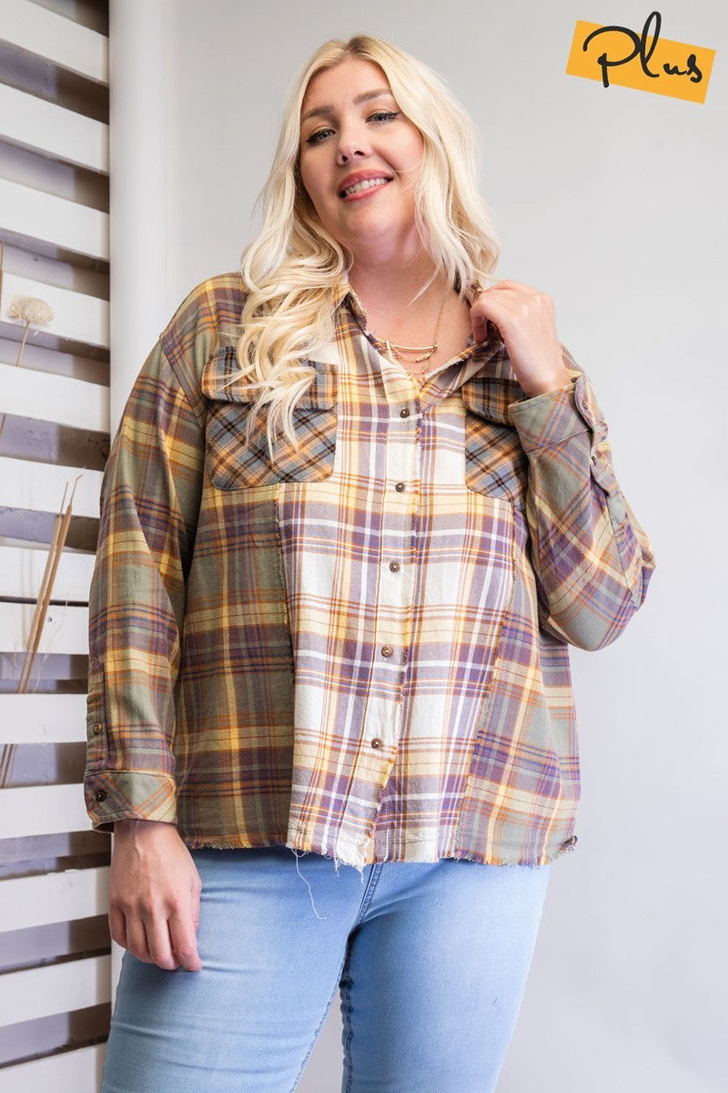 Plaid Mix Button Down Shirt in faded olive color with chest patch pockets and frayed bottom hem, showcasing a loose fit and boxy silhouette.