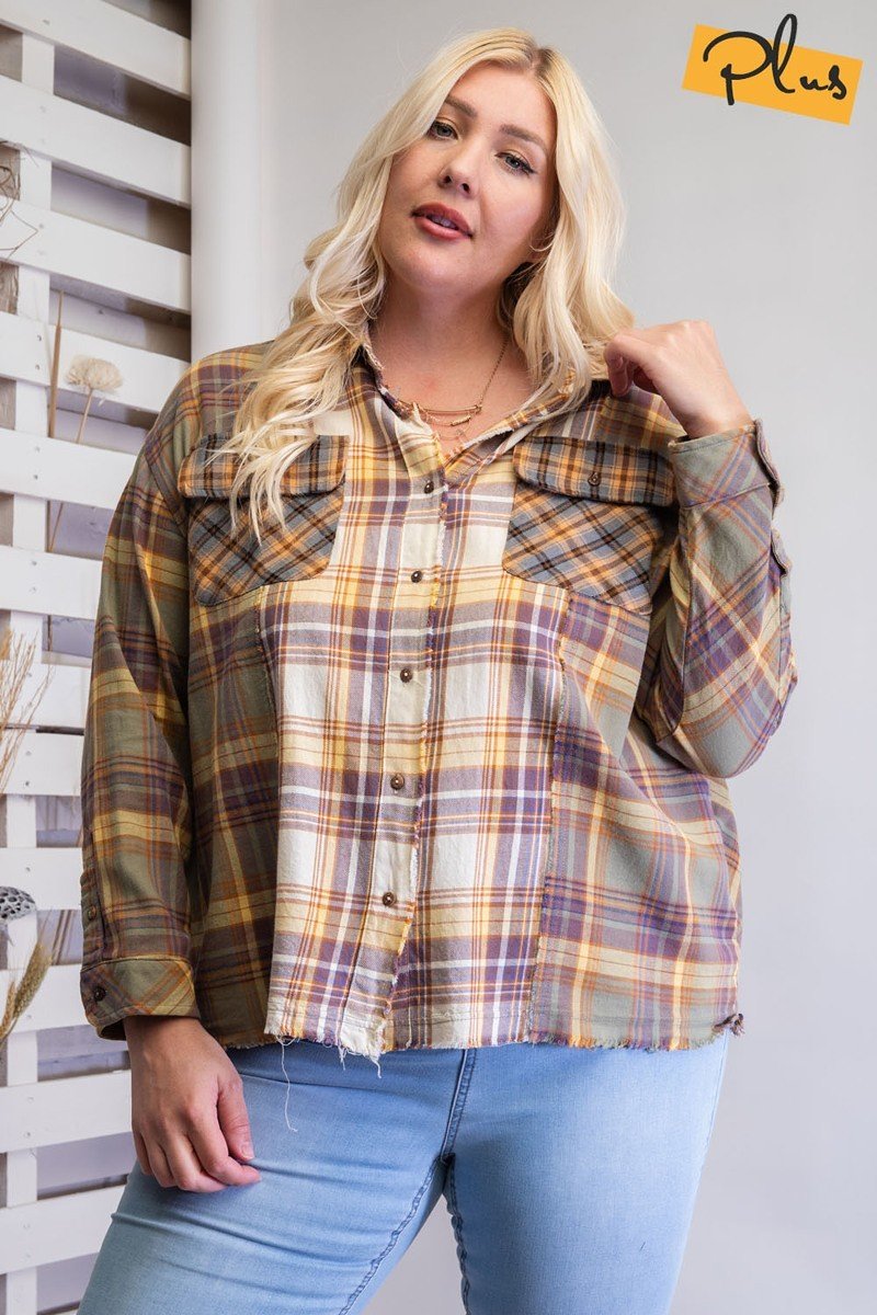 Plaid Mix Button Down Shirt in faded olive color with chest patch pockets and frayed bottom hem, showcasing a loose fit and boxy silhouette.