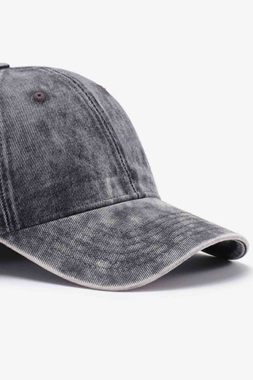 Plain adjustable baseball cap made of 100% cotton, featuring a solid pattern and adjustable strap for a comfortable fit.