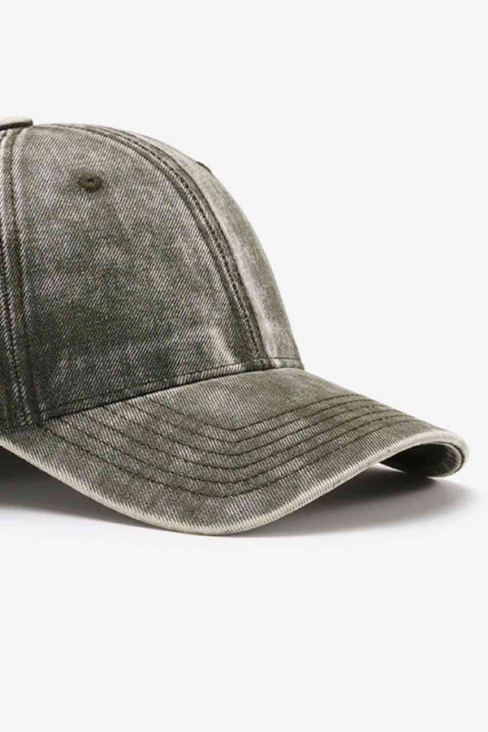 Plain adjustable baseball cap made of 100% cotton, featuring a solid pattern and adjustable strap for a comfortable fit.