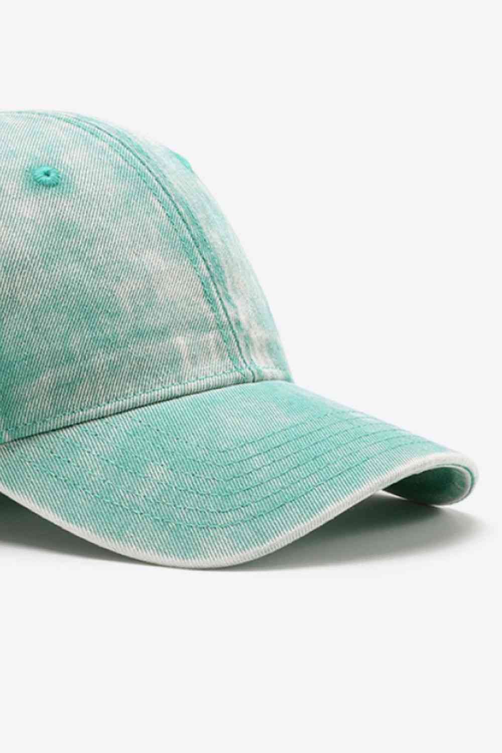 Plain adjustable baseball cap made of 100% cotton, featuring a solid pattern and adjustable strap for a comfortable fit.