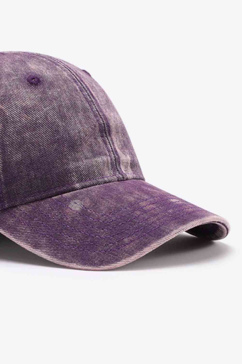 Plain adjustable baseball cap made of 100% cotton, featuring a solid pattern and adjustable strap for a comfortable fit.