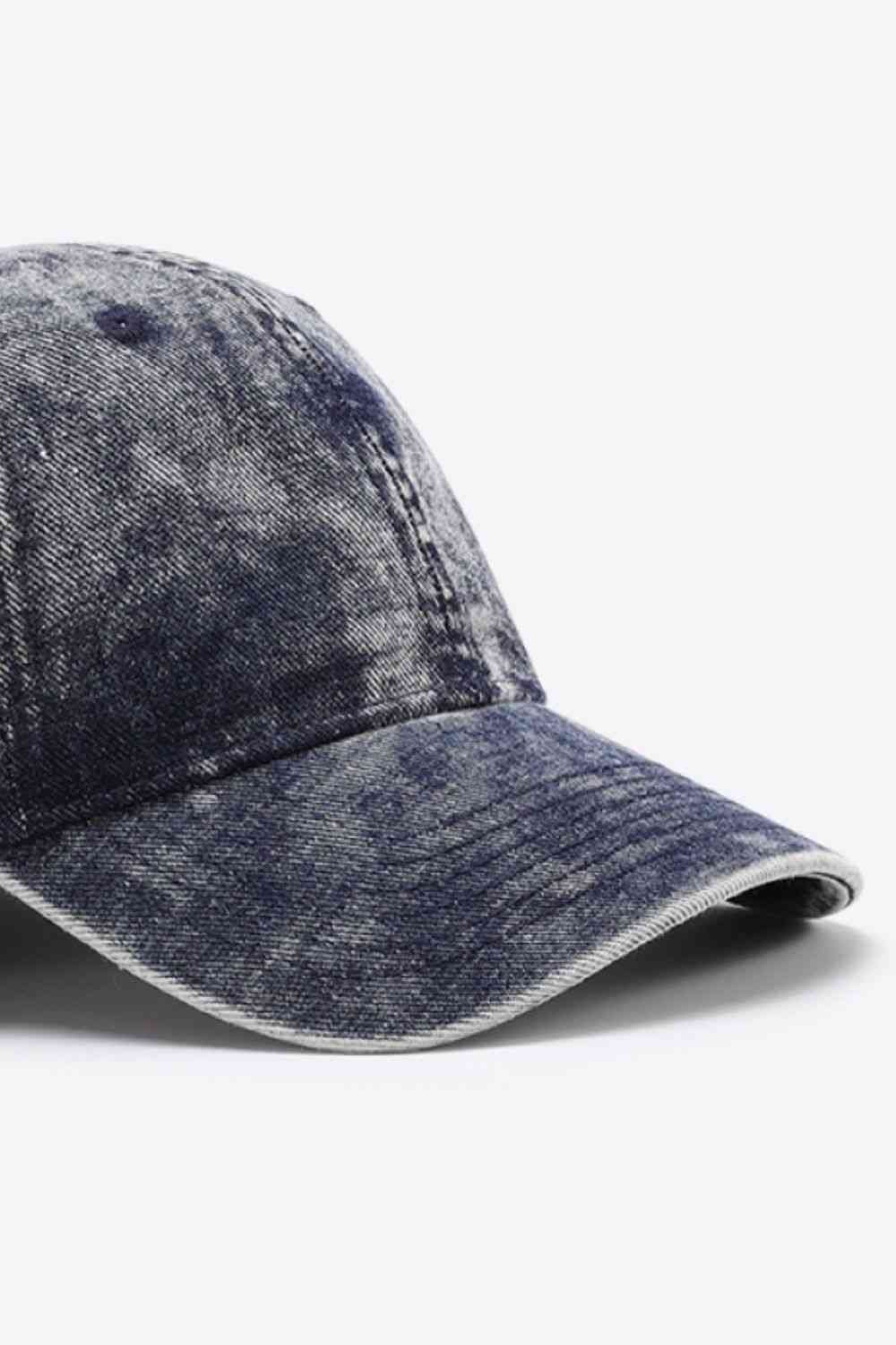 Plain adjustable baseball cap made of 100% cotton, featuring a solid pattern and adjustable strap for a comfortable fit.