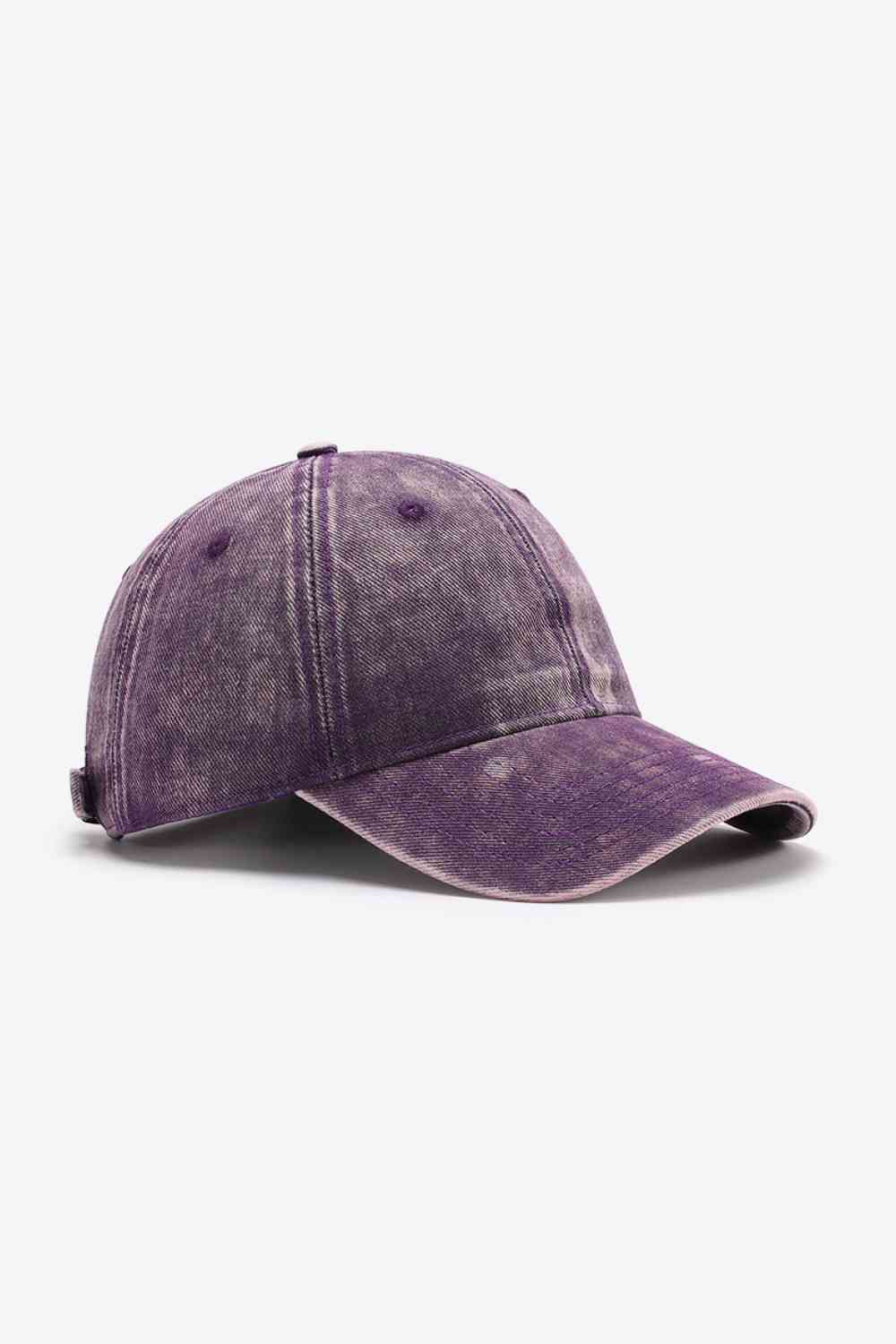 Plain adjustable baseball cap made of 100% cotton, featuring a solid pattern and adjustable strap for a comfortable fit.