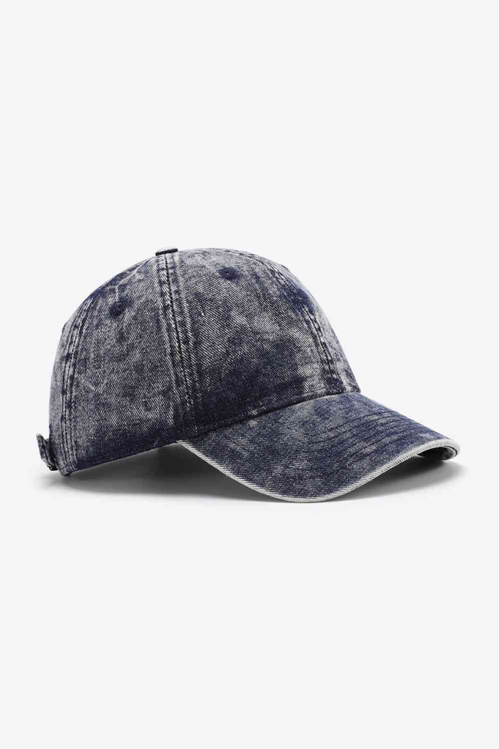 Plain adjustable baseball cap made of 100% cotton, featuring a solid pattern and adjustable strap for a comfortable fit.