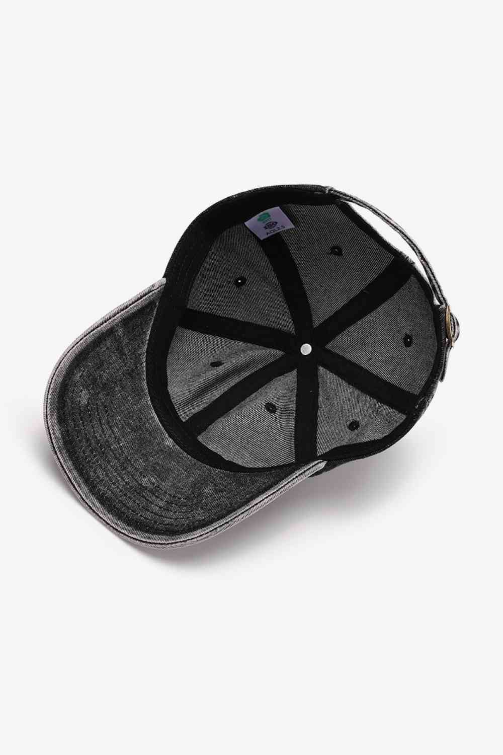 Plain adjustable baseball cap made of 100% cotton, featuring a solid pattern and adjustable strap for a comfortable fit.