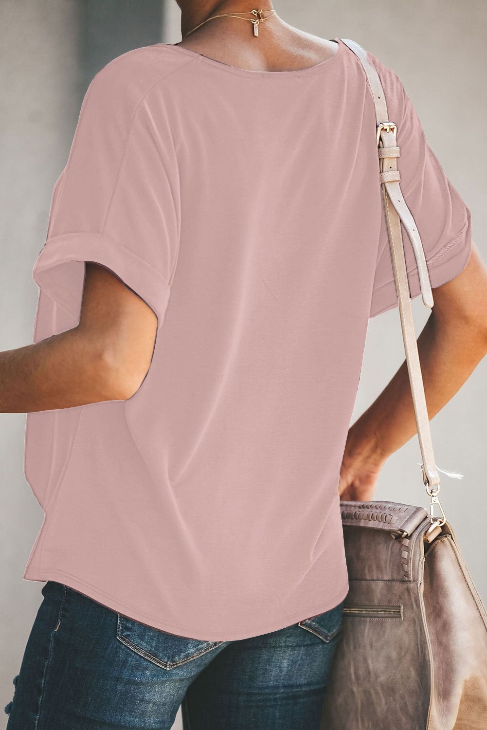 A stylish Plain Short Sleeve Twist Tee featuring a unique twist design, scoop neck, and kangaroo pouch, perfect for autumn wear.