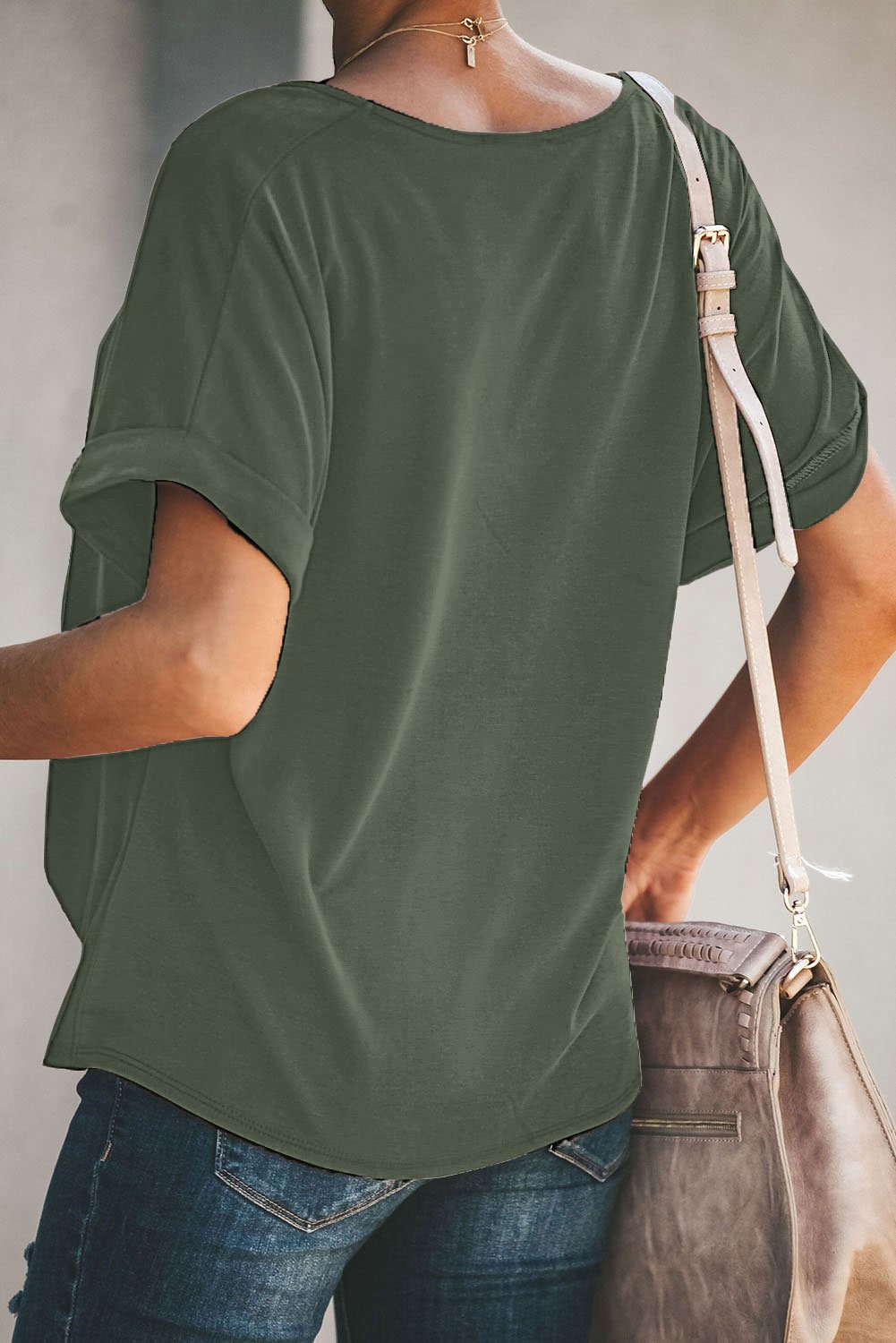 A stylish Plain Short Sleeve Twist Tee featuring a unique twist design, scoop neck, and kangaroo pouch, perfect for autumn wear.