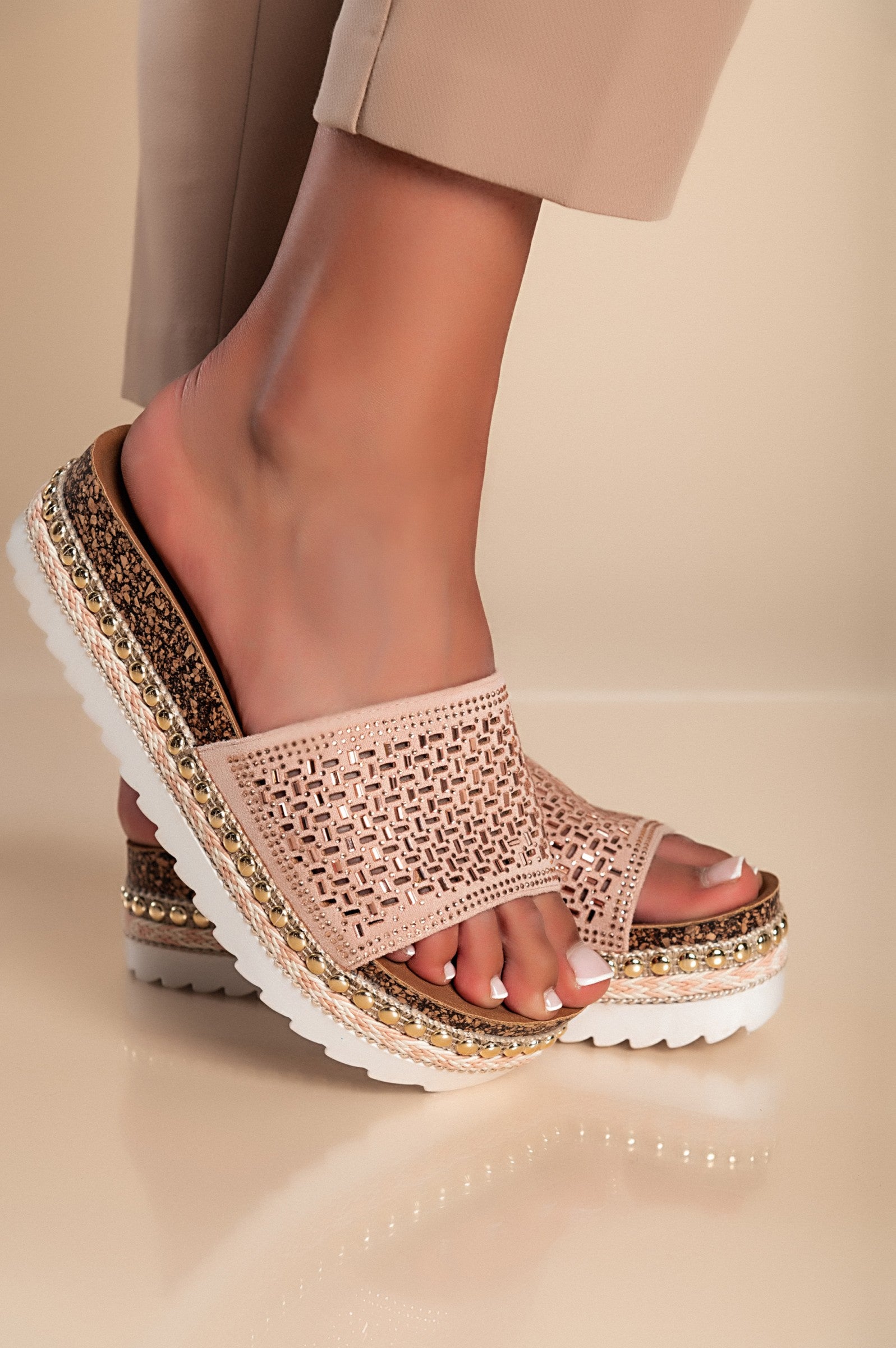 Stylish pink platform sandals with rhinestone embellishments and a round toe design, perfect for comfortable wear.