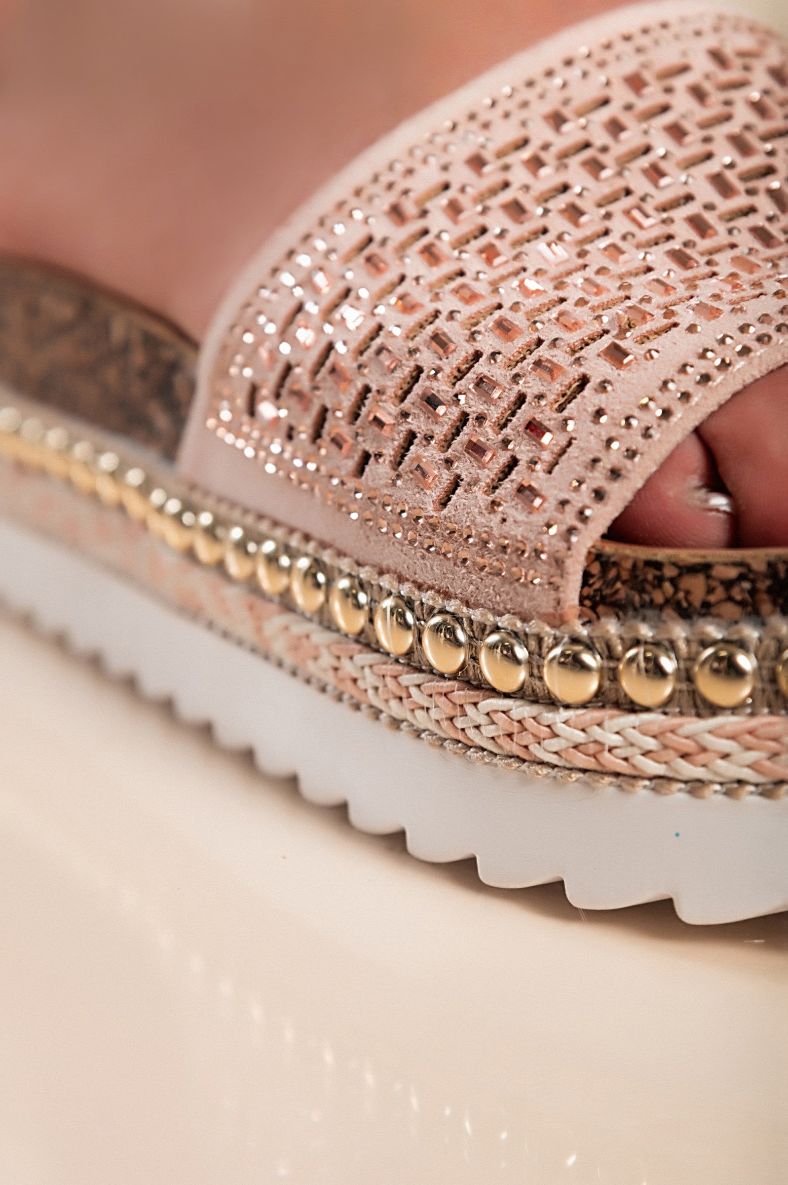 Stylish pink platform sandals with rhinestone embellishments and a round toe design, perfect for comfortable wear.