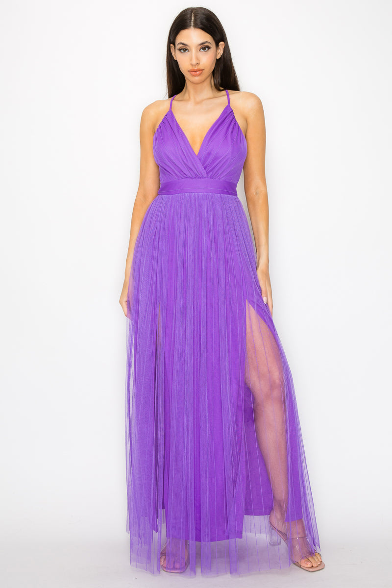 A stylish Pleated Mesh Slit Maxi Dress in purple featuring a pleated front slit, v-neckline, and adjustable cami straps, perfect for elegant occasions.