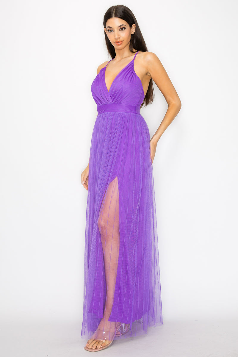 A stylish Pleated Mesh Slit Maxi Dress in purple featuring a pleated front slit, v-neckline, and adjustable cami straps, perfect for elegant occasions.