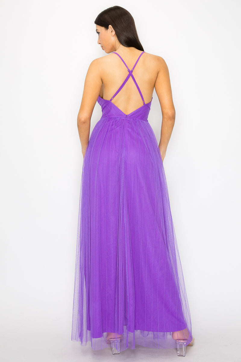 A stylish Pleated Mesh Slit Maxi Dress in purple featuring a pleated front slit, v-neckline, and adjustable cami straps, perfect for elegant occasions.