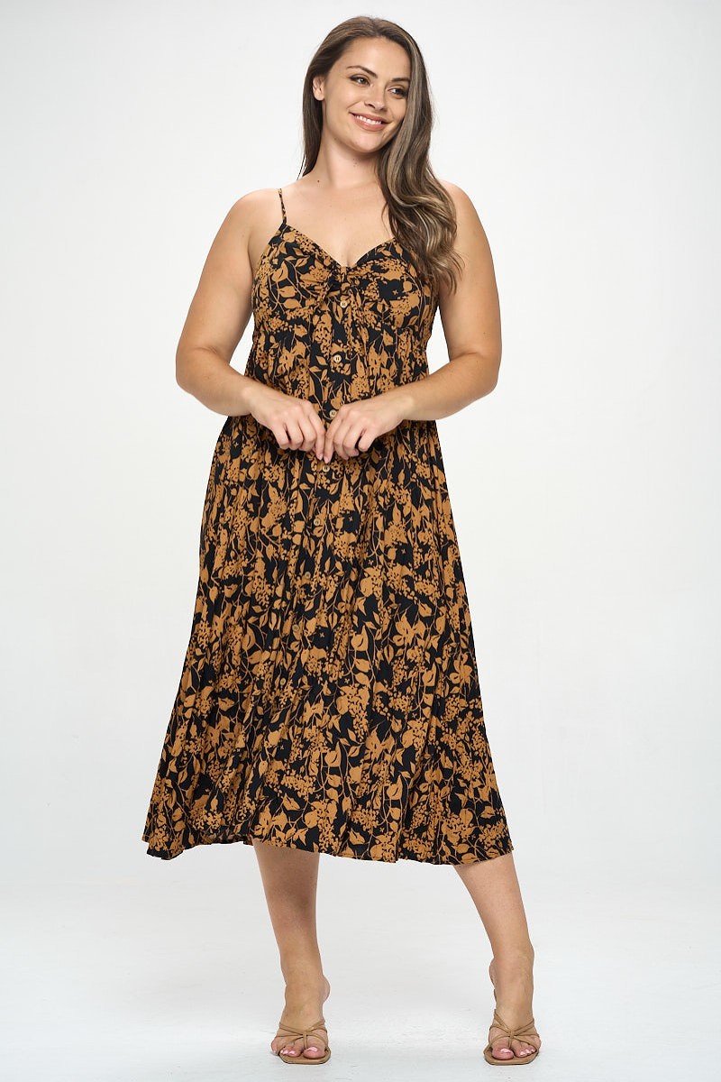 A stylish plus-size maxi dress featuring a botanical print and a front tie detail, perfect for various occasions.