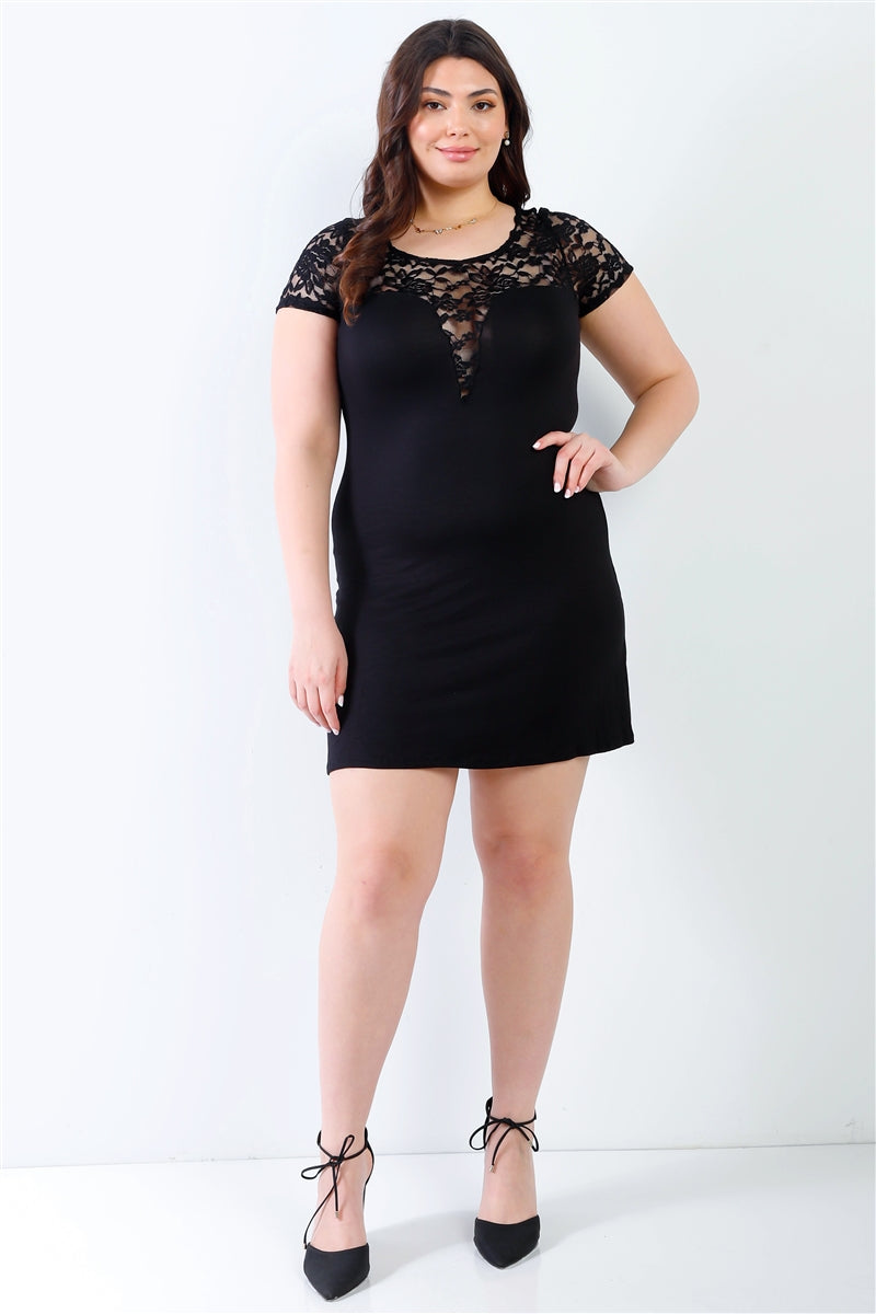 A stylish plus-size mini dress featuring lace details, short sleeves, and a round neckline in black, perfect for casual and elegant occasions.