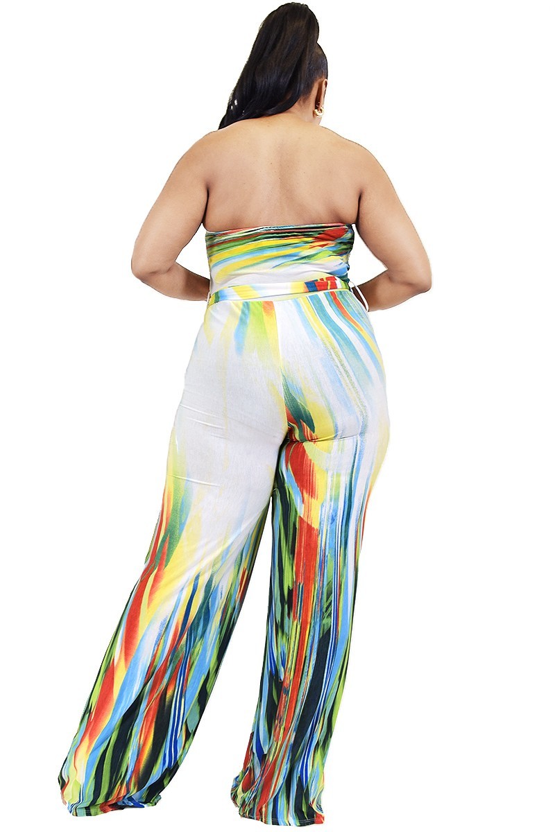 Plus size off shoulder jumpsuit with tie waist and wide leg design in white and multi colors.