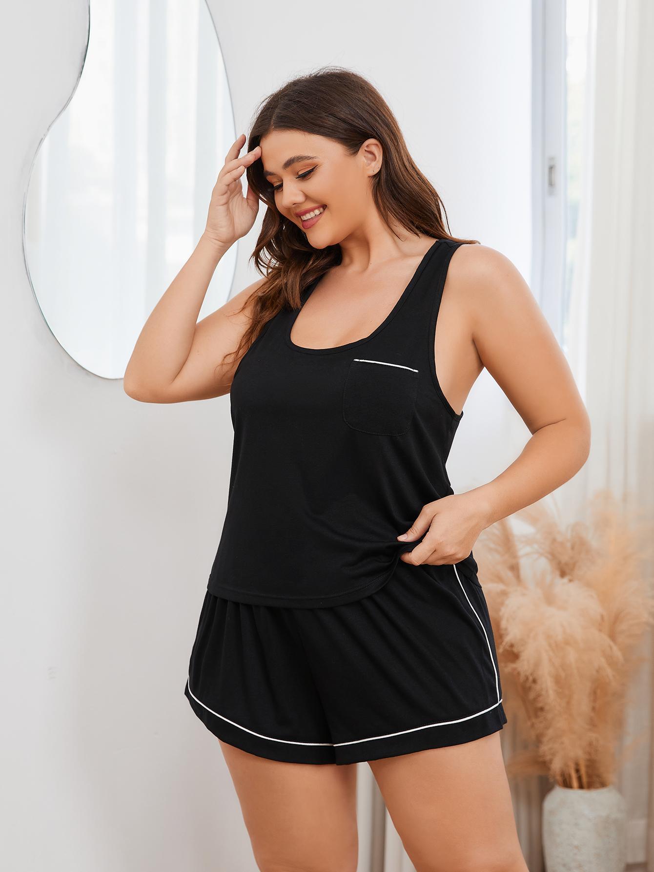 Plus size lounge set featuring a contrast piping racerback tank top and shorts, designed for comfort and style.