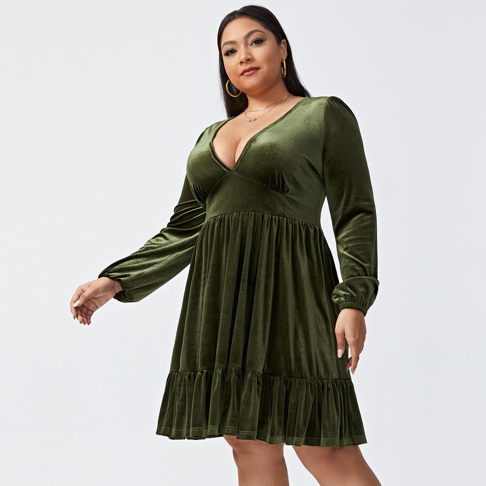 Plus size deep V long sleeve velvet dress with ruffle hem, showcasing elegant design and soft fabric.