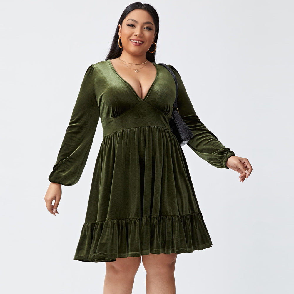 Plus size deep V long sleeve velvet dress with ruffle hem, showcasing elegant design and soft fabric.