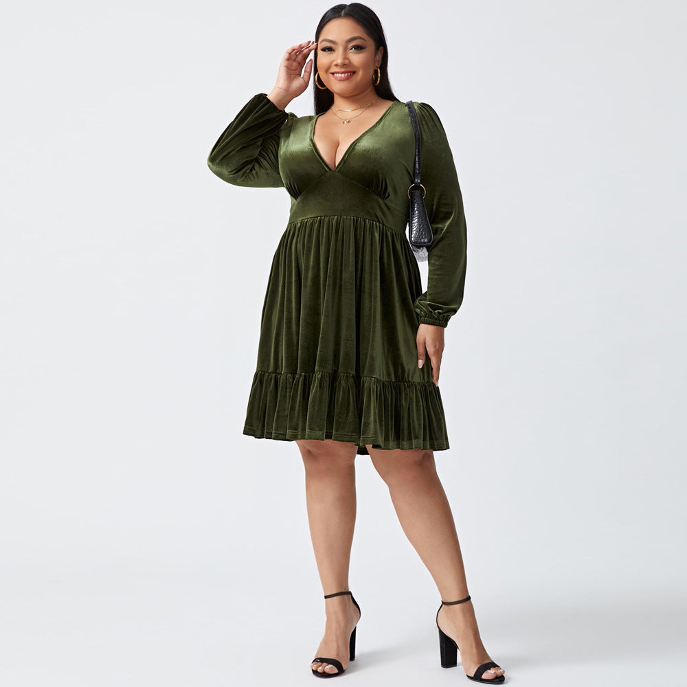 Plus size deep V long sleeve velvet dress with ruffle hem, showcasing elegant design and soft fabric.