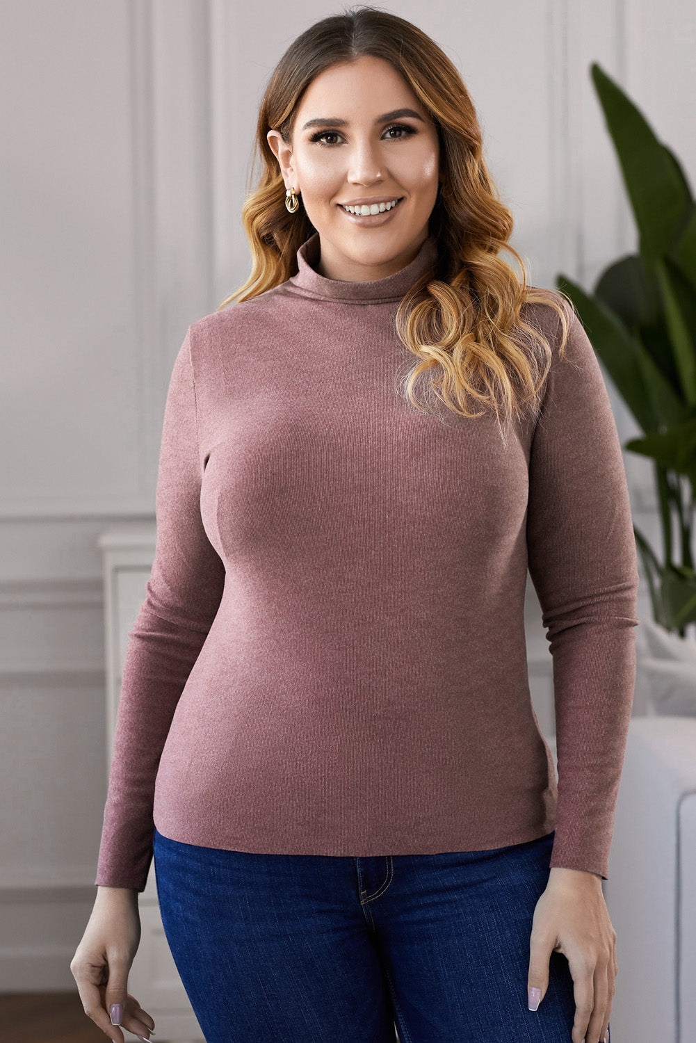 A stylish plus size mock neck long sleeve top in solid color, showcasing its casual chic design and comfortable fit.