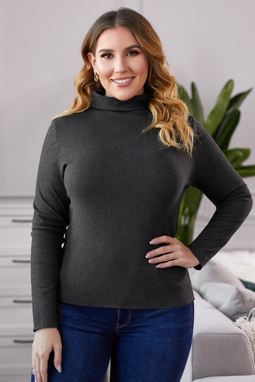 A stylish plus size mock neck long sleeve top in solid color, showcasing its casual chic design and comfortable fit.