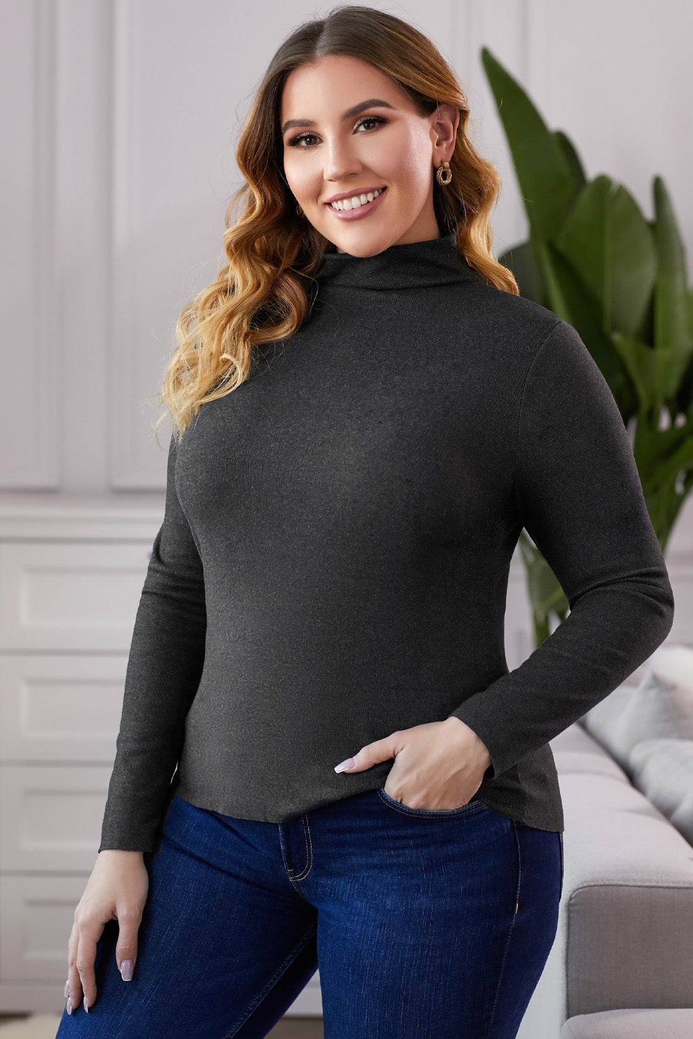 A stylish plus size mock neck long sleeve top in solid color, showcasing its casual chic design and comfortable fit.