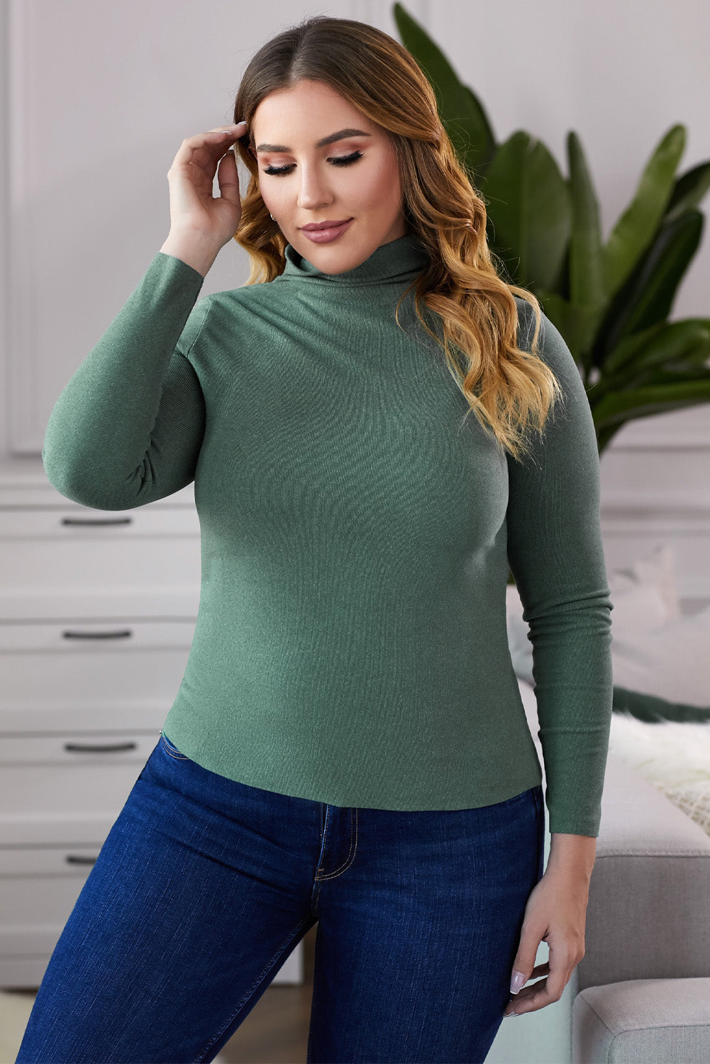 A stylish plus size mock neck long sleeve top in solid color, showcasing its casual chic design and comfortable fit.