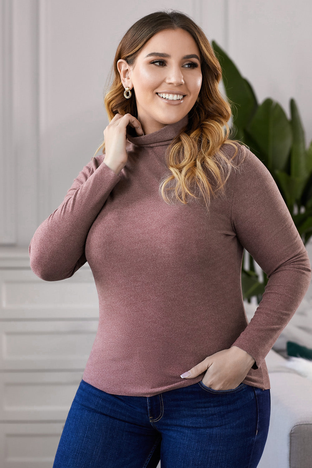 A stylish plus size mock neck long sleeve top in solid color, showcasing its casual chic design and comfortable fit.