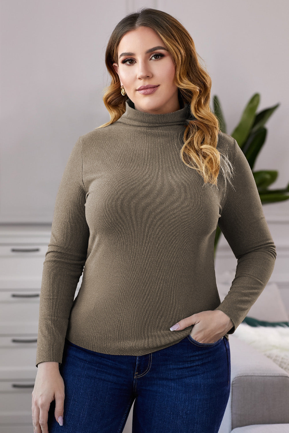 A stylish plus size mock neck long sleeve top in solid color, showcasing its casual chic design and comfortable fit.