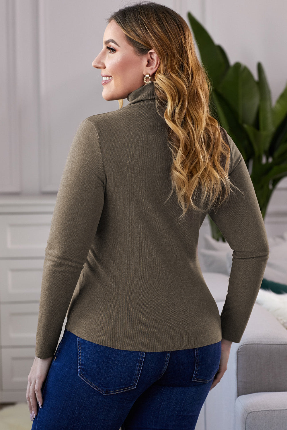 A stylish plus size mock neck long sleeve top in solid color, showcasing its casual chic design and comfortable fit.