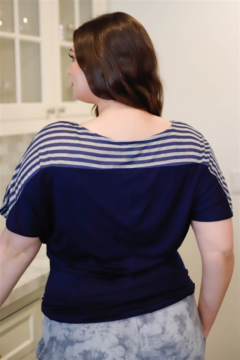 A stylish Plus Stripe Short Sleeve Top featuring bell sleeves, a round neckline, and a relaxed fit in navy with a chic stripe pattern.