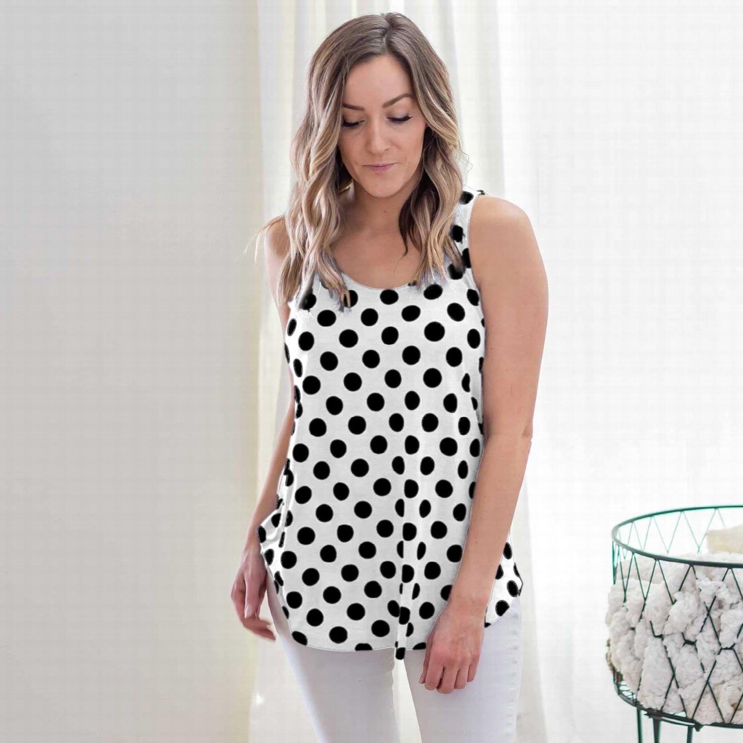 A stylish sleeveless top featuring a playful polka dot design, round neckline, and round hem, perfect for casual wear.