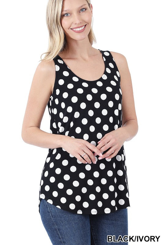 A stylish sleeveless top featuring a playful polka dot design, round neckline, and round hem, perfect for casual wear.