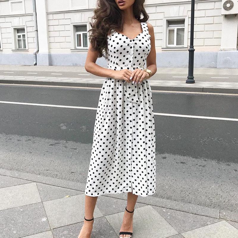 A stylish sleeveless polka dot women dress featuring a square collar and a belt, perfect for summer beach outings.