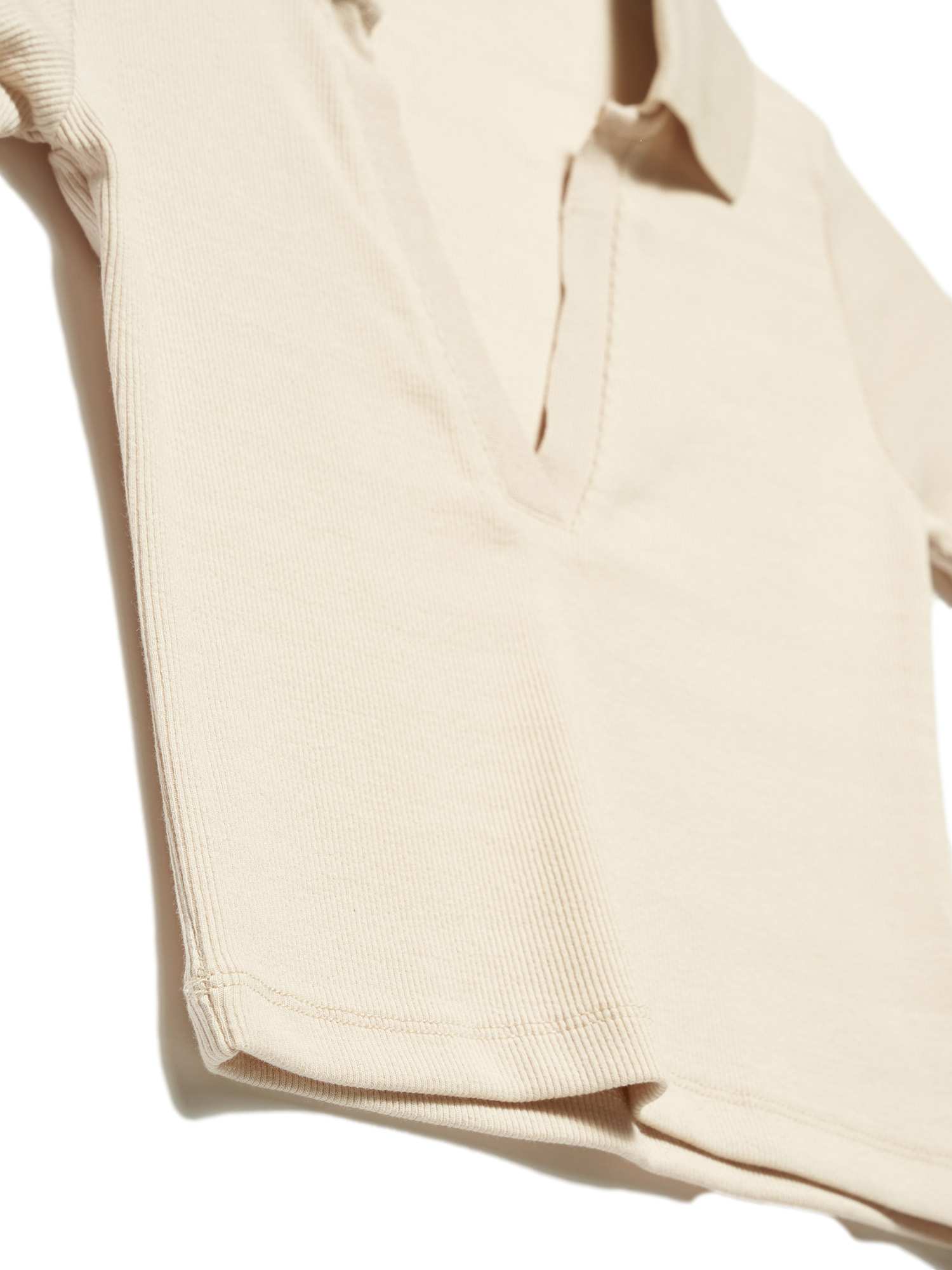 A stylish Polo Collar T-shirt made of 96% cotton and 4% elastane, showcasing its classic collar and soft fabric.