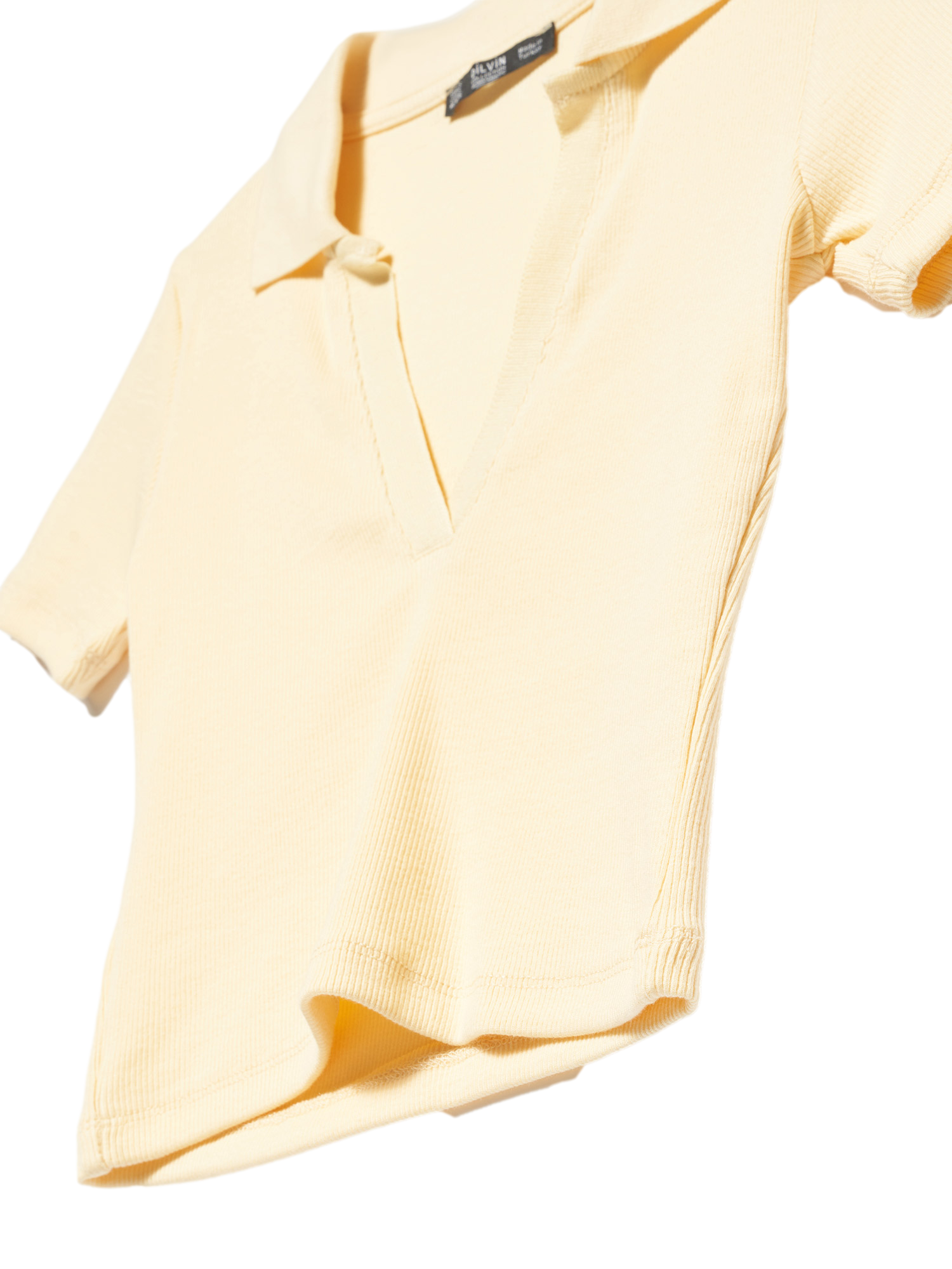 A stylish Polo Collar T-shirt made of 96% cotton and 4% elastane, showcasing its classic collar and soft fabric.