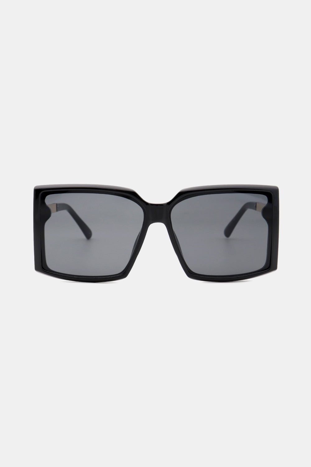 A pair of stylish square sunglasses with a polycarbonate frame and UV400 lenses, displayed in a protective case.