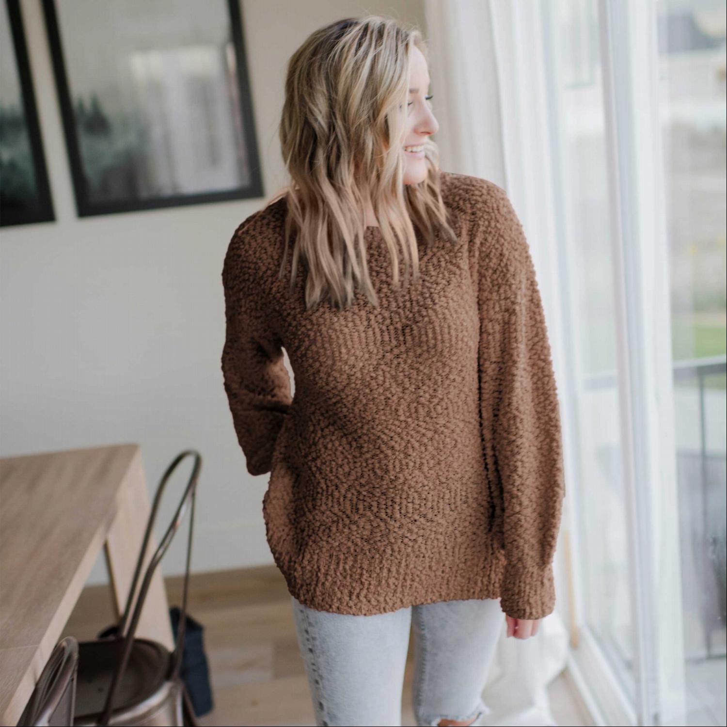 A cozy Popcorn Knit Bubble Sleeve Sweater featuring textured fabric, balloon sleeves, and a scoop neck, perfect for fall fashion.