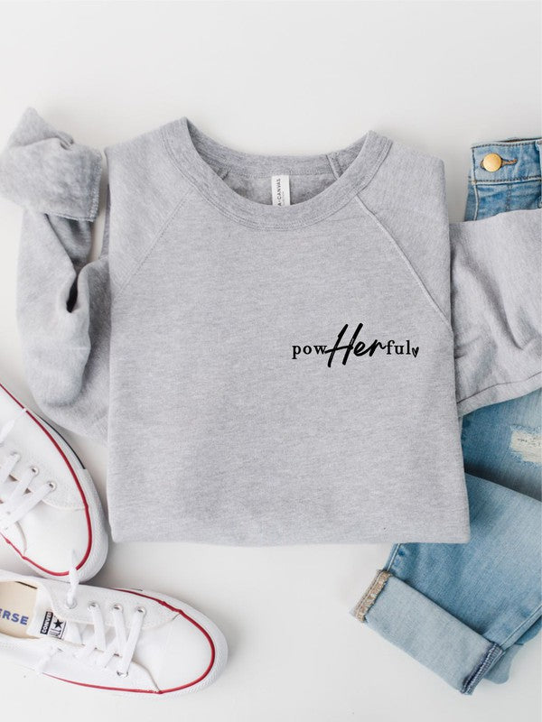 A stylish plus-size sweatshirt featuring the empowering text 'PowHerful' on the front and 'She Overcame Everything That Was Meant to Destroy Her' on the back.