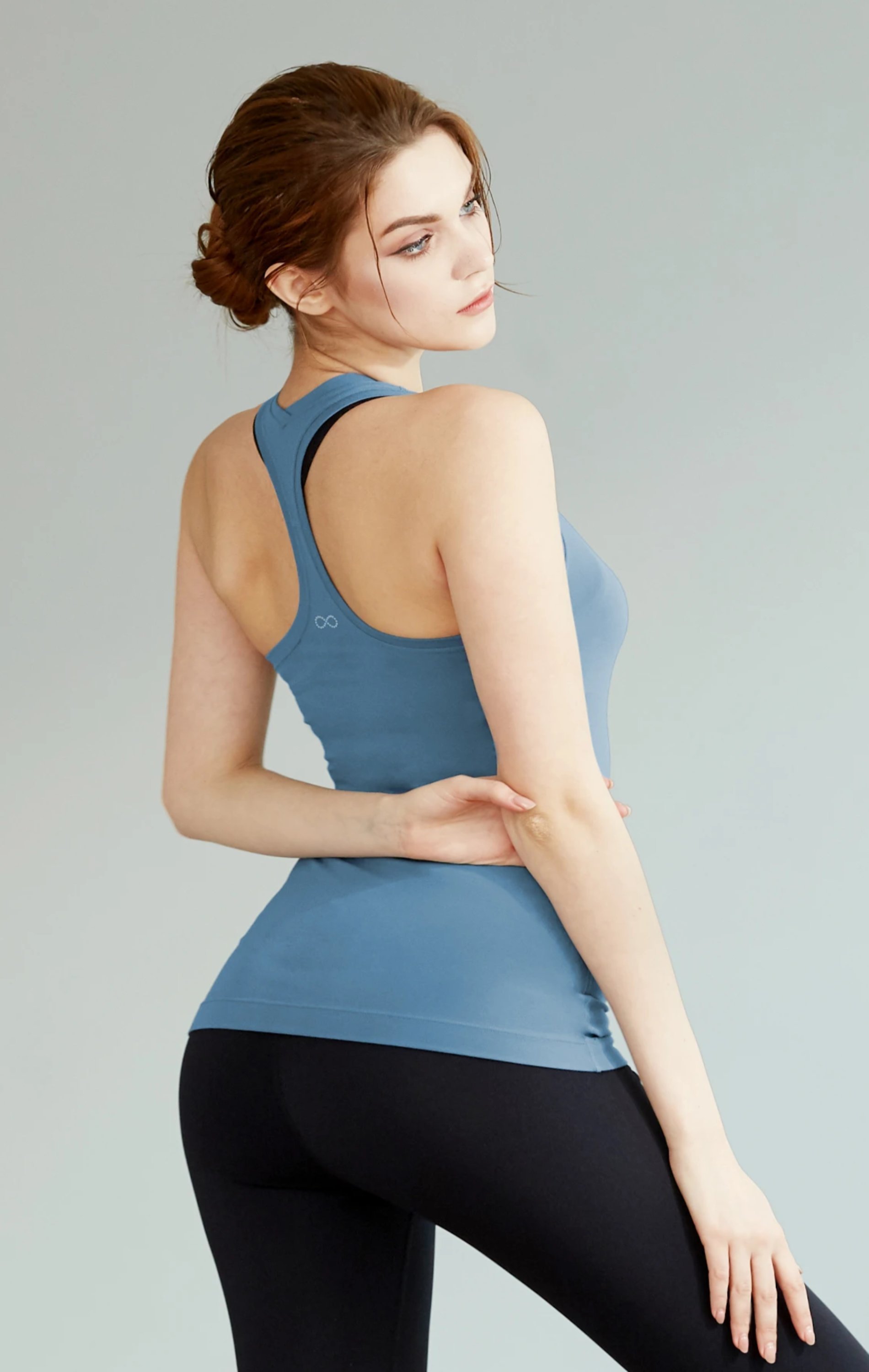 Light Blue Primer Racerback Coziplex™ Tank showcasing slim design and soft fabric, perfect for yoga and lounging.